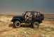 Jeep near shoreline
